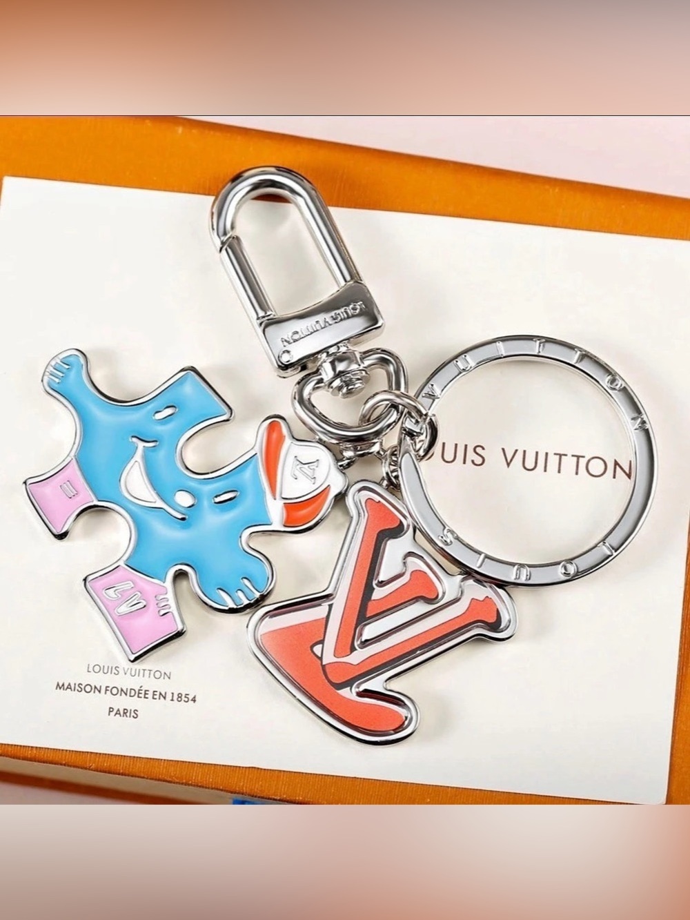 Inspired Luxury Lulu Puzzle Friends Bag Charm & Key Holder Silver & Blue